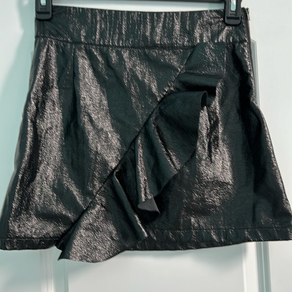 DO + BE mini skirt with asymmetrical ruffle detail. Black. Size M